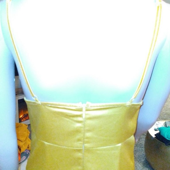 Golden yellow satin dress. Adjustable straps with a ruffle asymmetrical flare - Picture 6 of 9